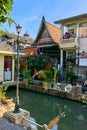 Thai houses along Khlong Rob Krung Canal in Bangkok Royalty Free Stock Photo