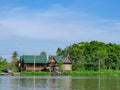 Thai houses and the Chaophraya river in Bangkok, Thailand Royalty Free Stock Photo