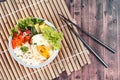 Thai jasmine rice topped soft boil eggs and fried herb. Royalty Free Stock Photo