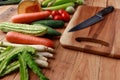 Thai kitchen. Various vegetables, spices  and Ingredients with knife and chopping board Royalty Free Stock Photo