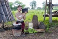 Thai lady beautiful dressing traditional northern style listening radio music from transistor a have happy joyful smiling in rice