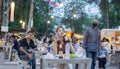 A woman was taking a beer during dinner at Tamarin night market, Hua Hin Thailand