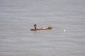 Thai and laos people riding long tail boat for catch fishing in mekong river at Royalty Free Stock Photo