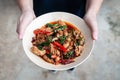 Thai local homemade food spicy stir fried chicken with chilli and herbs or Pad Ped Royalty Free Stock Photo