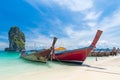 Thai long tail boats on the beach with beautiful island