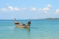 Thai longtail boat at Naiyang beach with blue sky Royalty Free Stock Photo