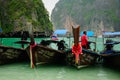 Thai Man on a boat in Maya Bay