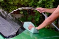 Thai man washing mini car green color