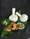 Thai massage with thai herbs on banana leaf and flower