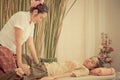 Thai massage Therapists is massaging a lady Royalty Free Stock Photo