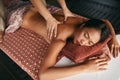 Thai Massage. Woman Having Relaxation Back Massage At Spa Salon Royalty Free Stock Photo