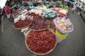 Thai merchants sell dried chilies and various spices. In a fresh morning market in Thailand.