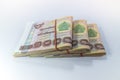 Thai Money, 1000 baht banknotes on white background.