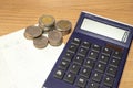 Thai money and book bank saving account on wooden table