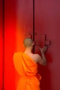 Thai monk and buddhist temple gate