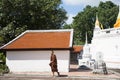 Thai monk people visit and respect praying buddha statue at Wat Kiean Bang Kaew