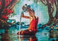 Thai Monk sitting in a stream assembled puzzle image