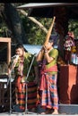 Thai music band playing Pong Lang traditional instrument during festival.