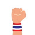 Thai national flag wristband on clenched fist on white background, vector illustration