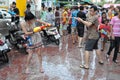 Thai New Year Revellers Enjoy a Water Fight Royalty Free Stock Photo