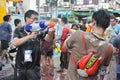 Thai New Year Revellers Enjoy a Water Fight Royalty Free Stock Photo