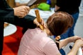 Thai northern ancient medical use a wooden wedge and wooden hammer to poke around the body to heal body aches