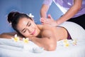 Thai oil back and spiral massage to Asian beauty woman  in spa Royalty Free Stock Photo