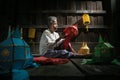 Thai old women made the lantern for yeepeng festival Royalty Free Stock Photo