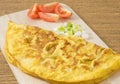 Thai Omelette with Tomatoes and Scallion on Cutting Board Royalty Free Stock Photo