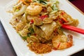 Thai Pad Kee Mao Rice Noodle with Prawns Dish Royalty Free Stock Photo