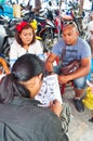 Thai painter draws picture for the tourists in Chatuchak market