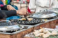 Thai Pancake, Male hands making khanom krok Traditional Thai desserts with delicious