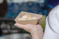 Thai Pancake, Women hands holding khanom krok Traditional Thai desserts with delicious