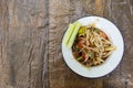 Thai papaya sald Somtum on wood background