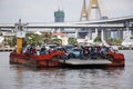 Thai passage ferryboat or ferry boat barge transport carry pick up vehicle crossing chao phraya river at Phra Pradaeng pier harbor