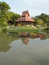 Thai pavilion and flower boat Royalty Free Stock Photo