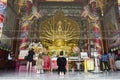 Thai peole praying Guanyin bodhisattva and Thousand Hands statue