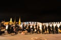 Thai people walking into Grand Palace to paying respect to the late King Bhumibol Adulyadej at night.