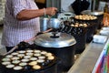 Thai people cooking thai snack Khanom Khrok