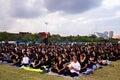 Thai people dressed in black as they sit and wait in line to offer condolences for Thailand`s late King Bhumibol Adulyadej