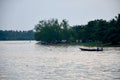Thai people driving long tail boat at Tapee river