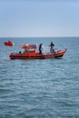 Thai people and fishing boats in the sea of Thailand.