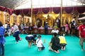 Thai people and foreign traveler respect praying and rite ritual god angel buddha statue at Wat Bang Phli Yai Nai Temple in Bang Royalty Free Stock Photo