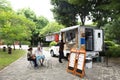 Thai people and foreign traveler visit travel Tanabata or Star Japanese festival and sitting eat food in garden