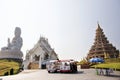 Thai people travelers visit and respect praying Buddha and Guan yin statues at Wat Huay Pla Kang Temple in Chiang Rai, Thailand Royalty Free Stock Photo