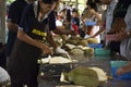 Thai people greengrocer peeling durian fruit for travelers people Royalty Free Stock Photo