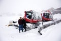 Thai people husband and wife travel and posing for take photo with Snowploughs machine