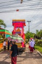 Thai people in a large group of a funeral procession in Thailand