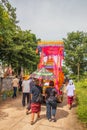 Thai people in a large group of a funeral procession in Thailand