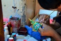 Thai people painting Khon Head plaster doll